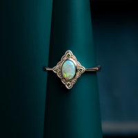 Opal and baby green diamond ring