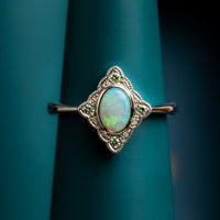 Opal and baby green diamond ring