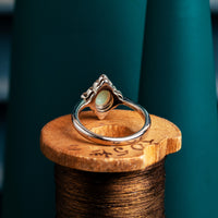 Opal and baby green diamond ring