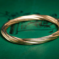 9ct yellow gold twisted hinged bangle