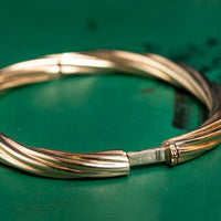 9ct yellow gold twisted hinged bangle