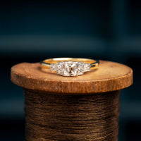 18ct and Platinum Cushion Cut Diamond Solitaire Ring with Deco Diamond Shoulders.