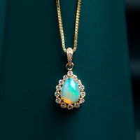 9ct yellow gold opal and diamond pendant