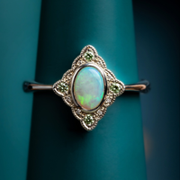 Opal and baby green diamond ring