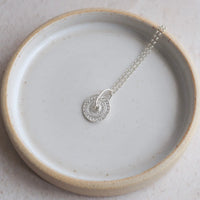 Silver Talisman Spinner Pendant Necklace