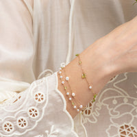 Lueur no 5- Pearl and Faceted Peridot Bracelet