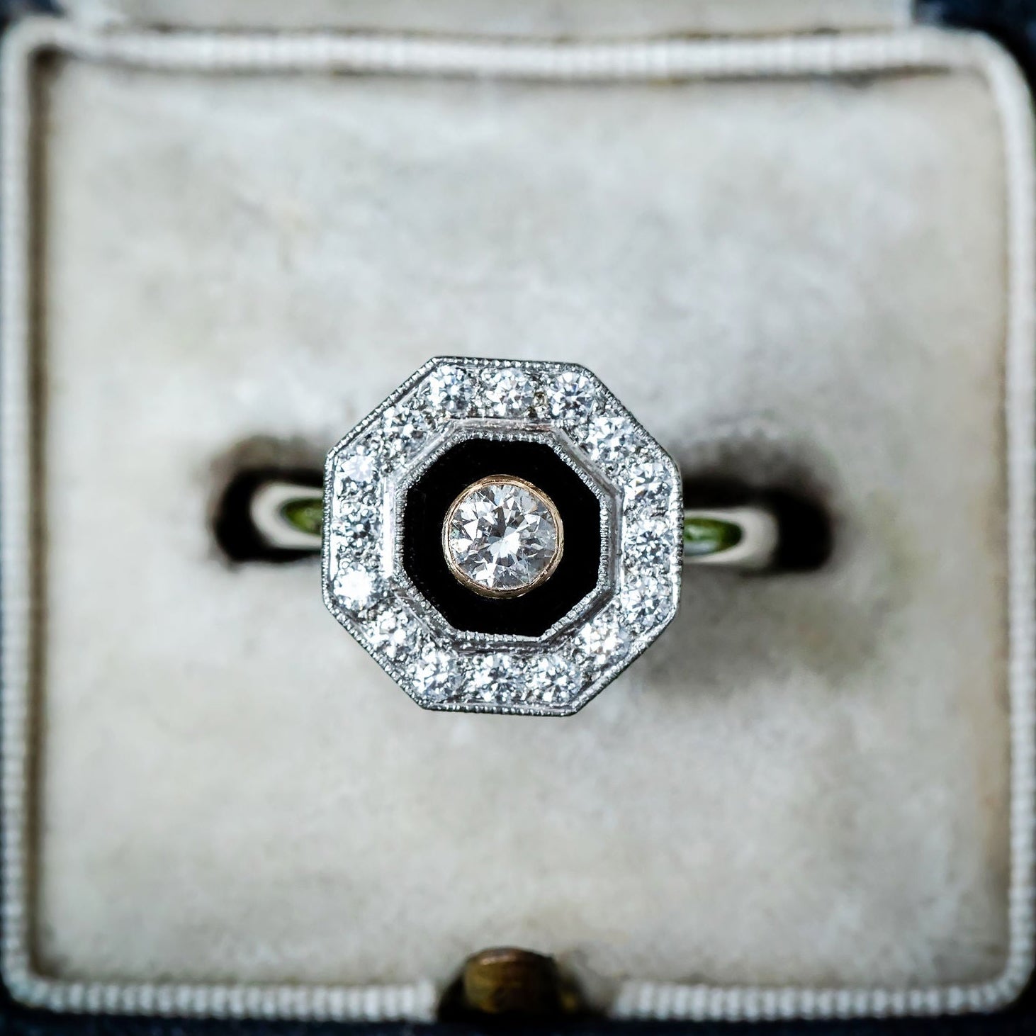 Art Deco style diamond ring with black onyx centre and diamonds in platinum