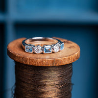 Aquamarine and Diamond band ring