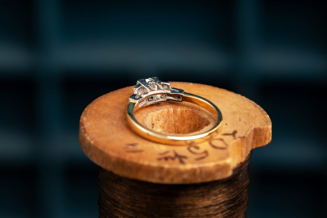 18ct and Platinum Cushion Cut Diamond Solitaire Ring with Deco Diamond Shoulders.
