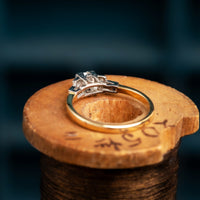 18ct and Platinum Cushion Cut Diamond Solitaire Ring with Deco Diamond Shoulders.