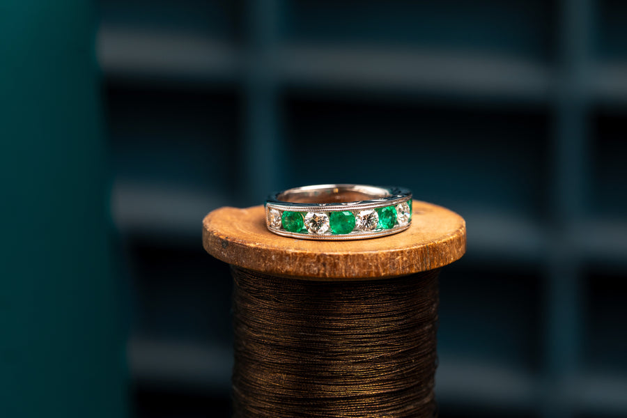 18ct white gold emerald and diamond half eternity