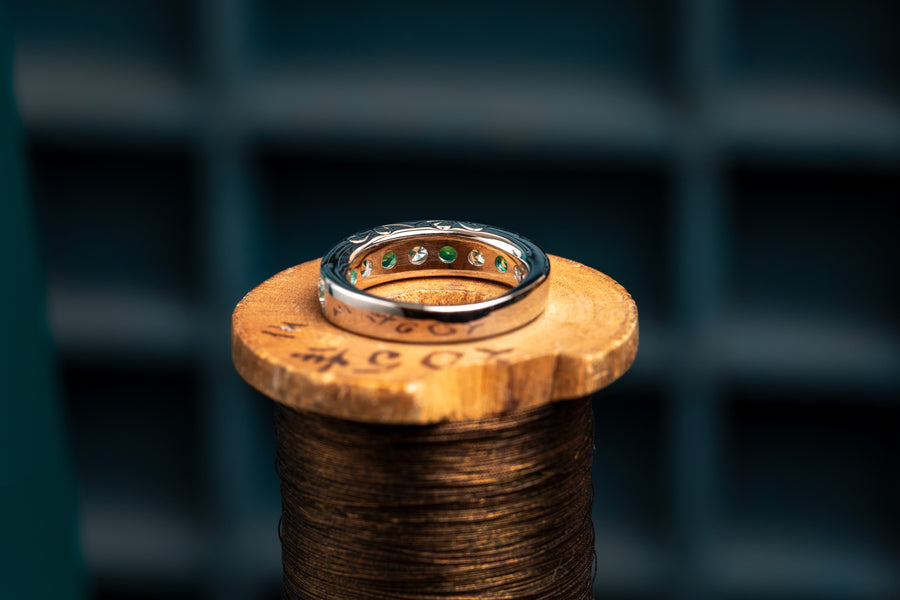 18ct white gold emerald and diamond half eternity