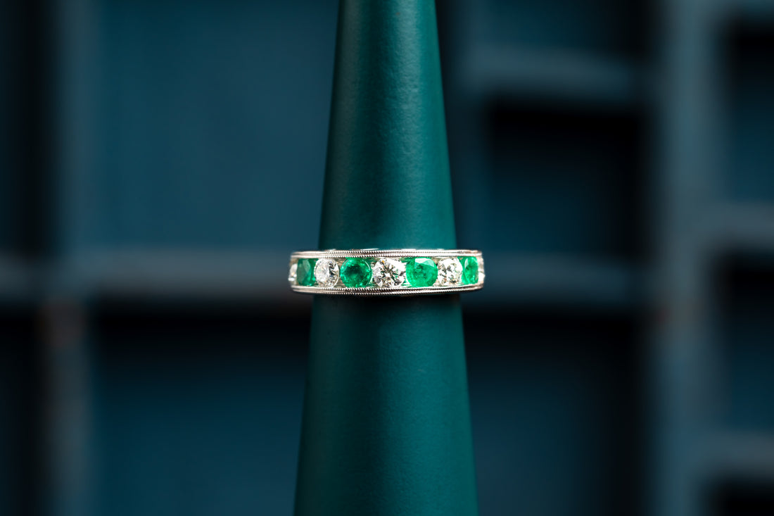 18ct white gold emerald and diamond half eternity