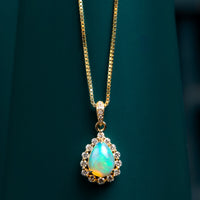 9ct yellow gold opal and diamond pendant