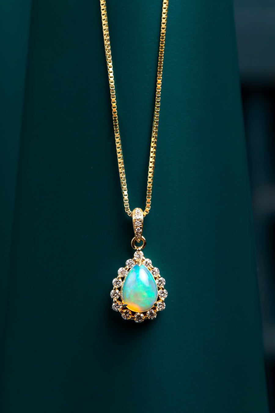 9ct yellow gold opal and diamond pendant