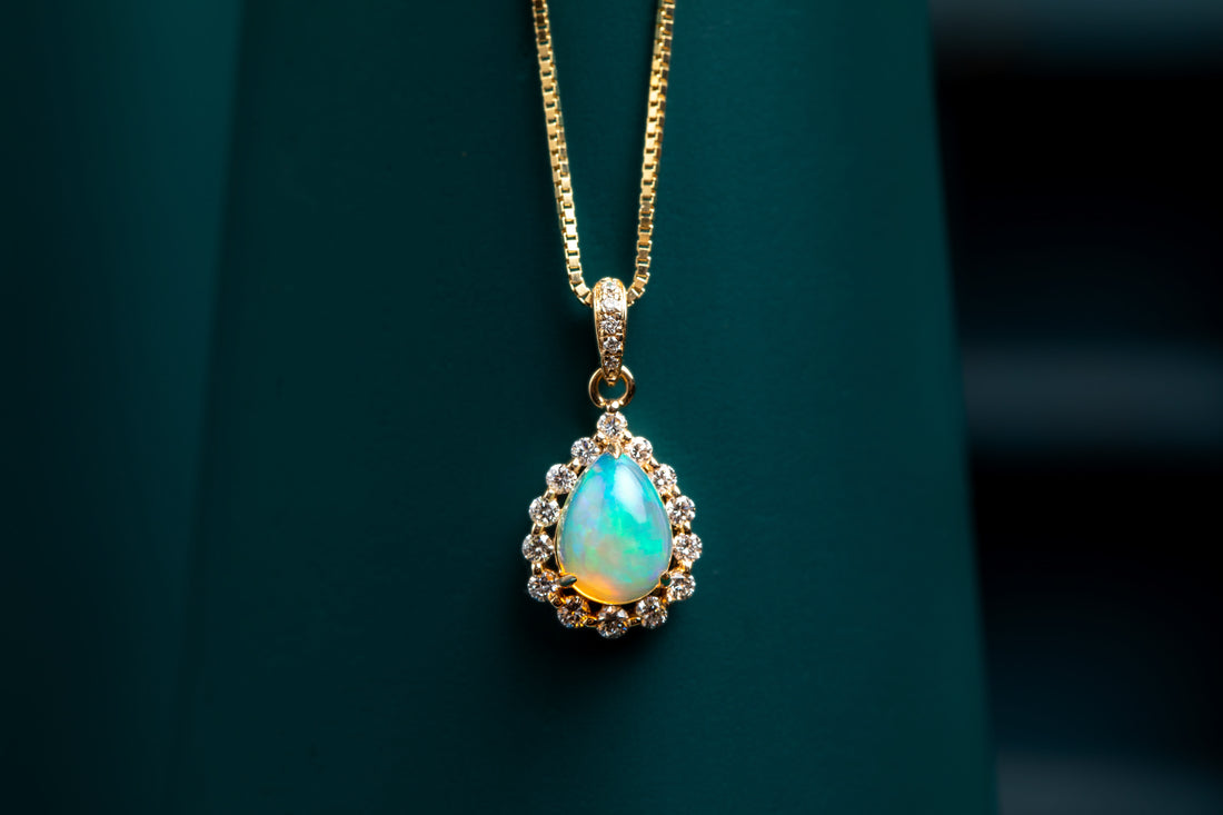 9ct yellow gold opal and diamond pendant