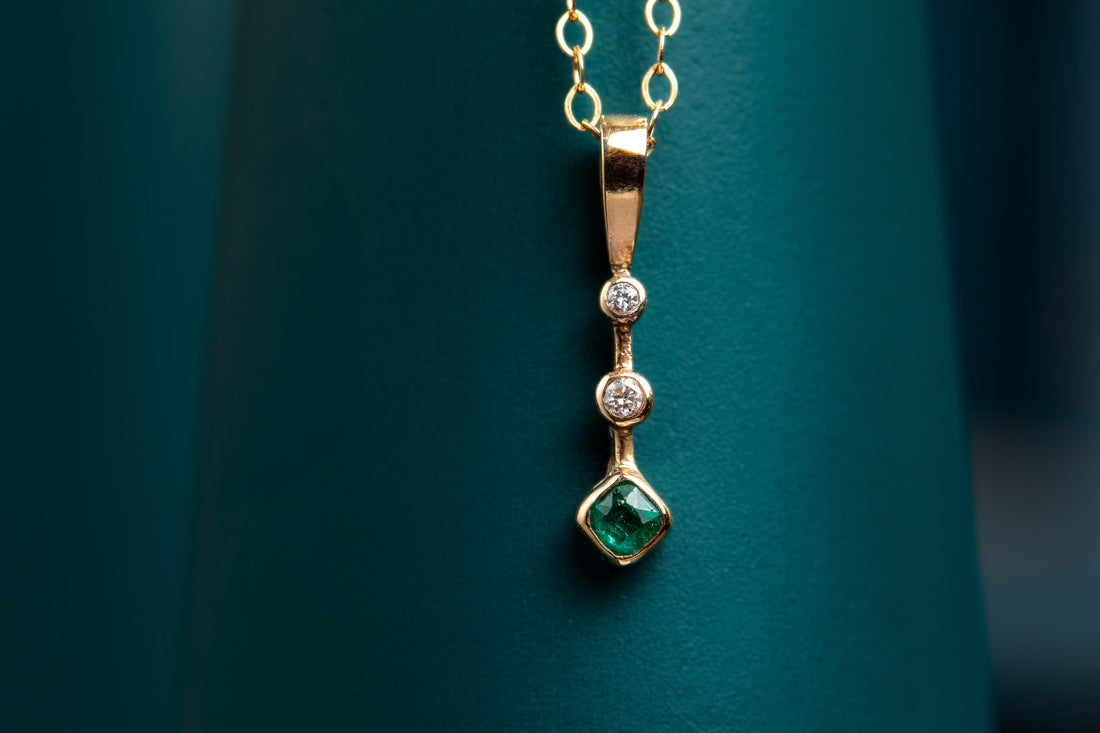 9ct yellow gold emerald and diamond drop pendant