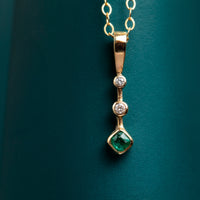 9ct yellow gold emerald and diamond drop pendant