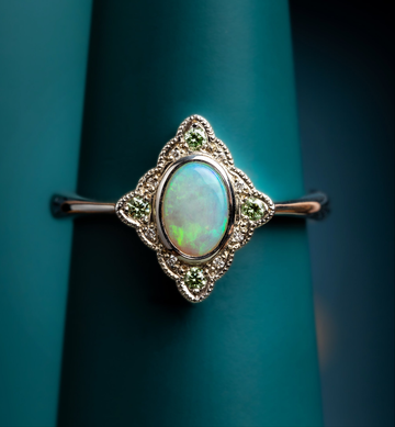 Opal and baby green diamond ring