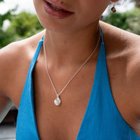 Silver Hammered Disc with White Topaz Necklace