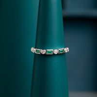 Emerald and diamond eternity ring